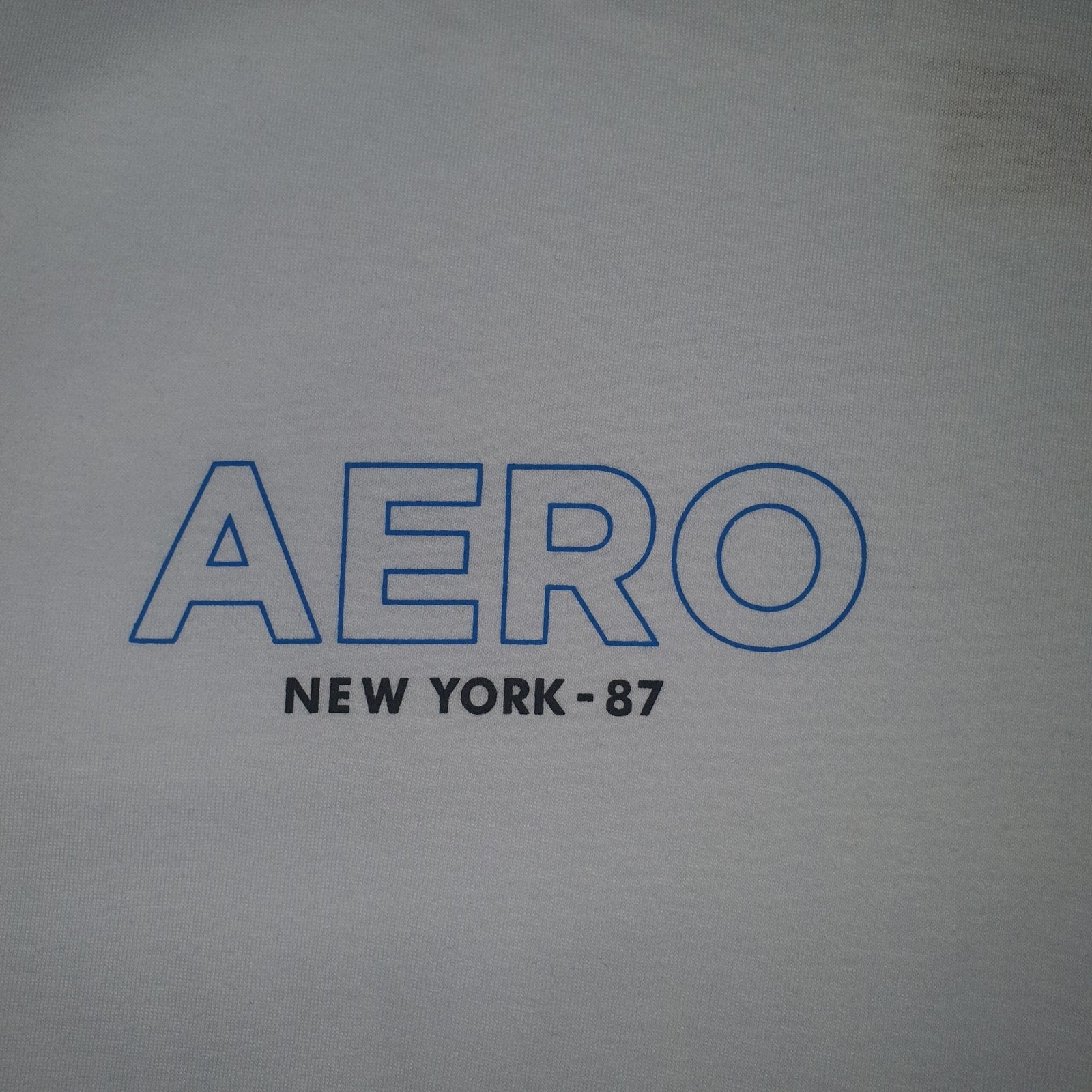 Camiseta Aeropostale Masculina Branca Detalhe na Gola Estampa Clássica